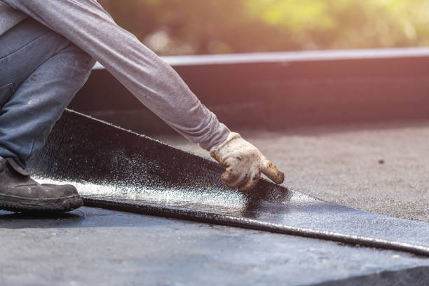 Professional Waterproofing technician working in Galveston, IN